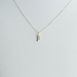 Necklace with a small pendant on a white background